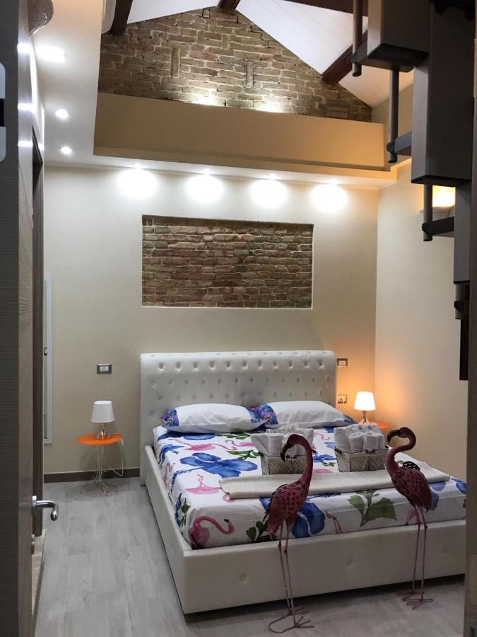 Flamingo Luxury Apartment Ajpsardinia กาญารี ภายนอก รูปภาพ