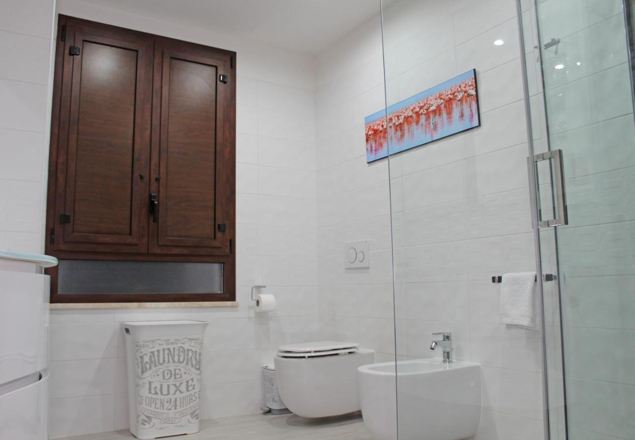 Flamingo Luxury Apartment Ajpsardinia กาญารี ภายนอก รูปภาพ